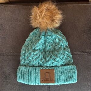 Never worn—-Striker Women’s Teal Knit Pom-Pom Beanie